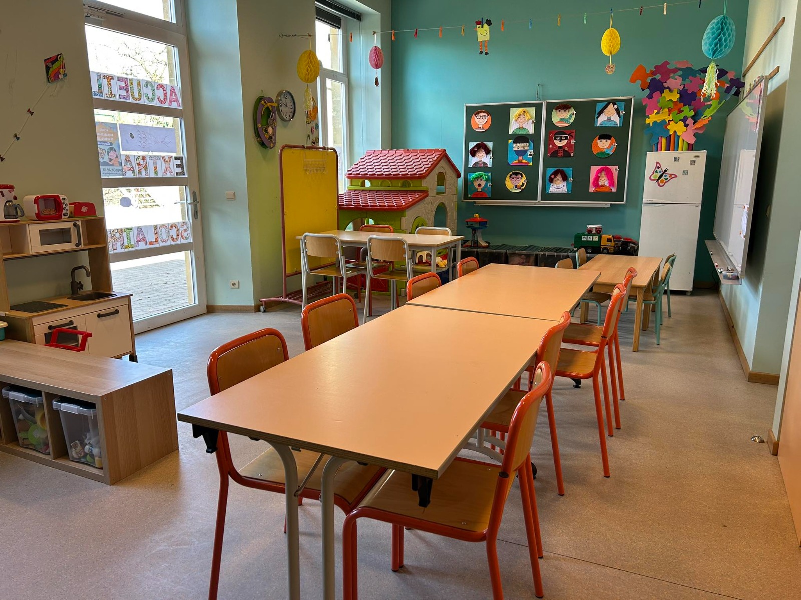 A render of three white cylindrical columns, against a warm creme background